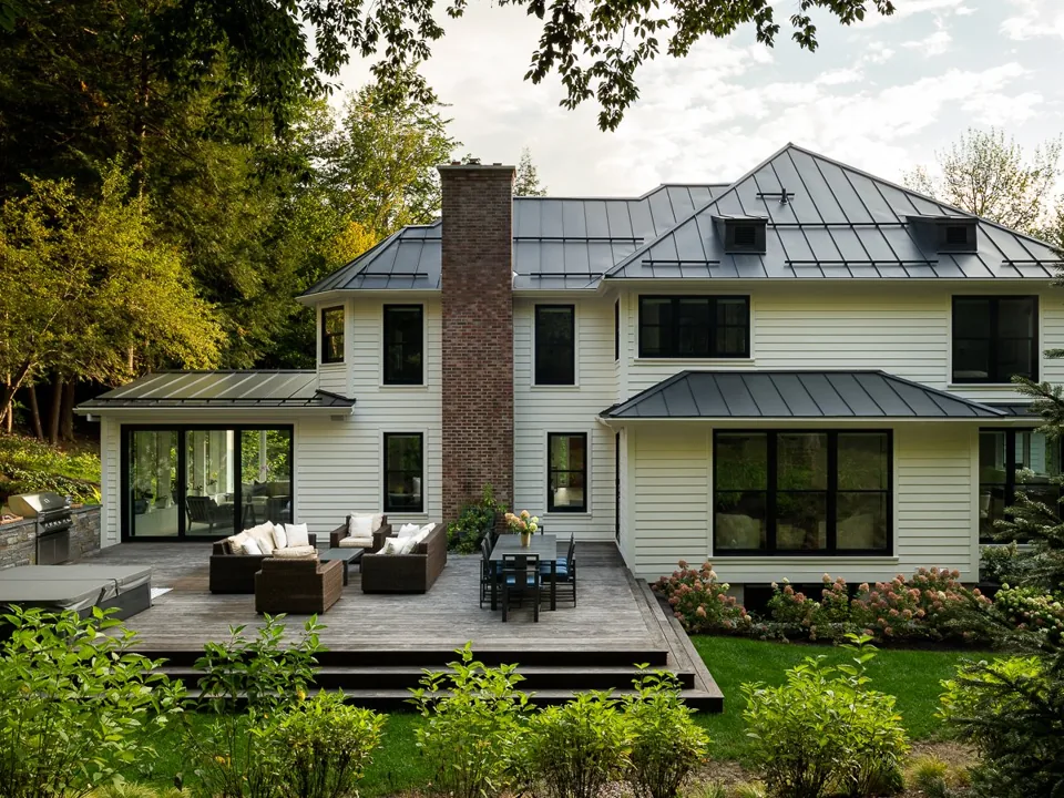 The renovated Richmond farmhouse from the terrace side in daylight
